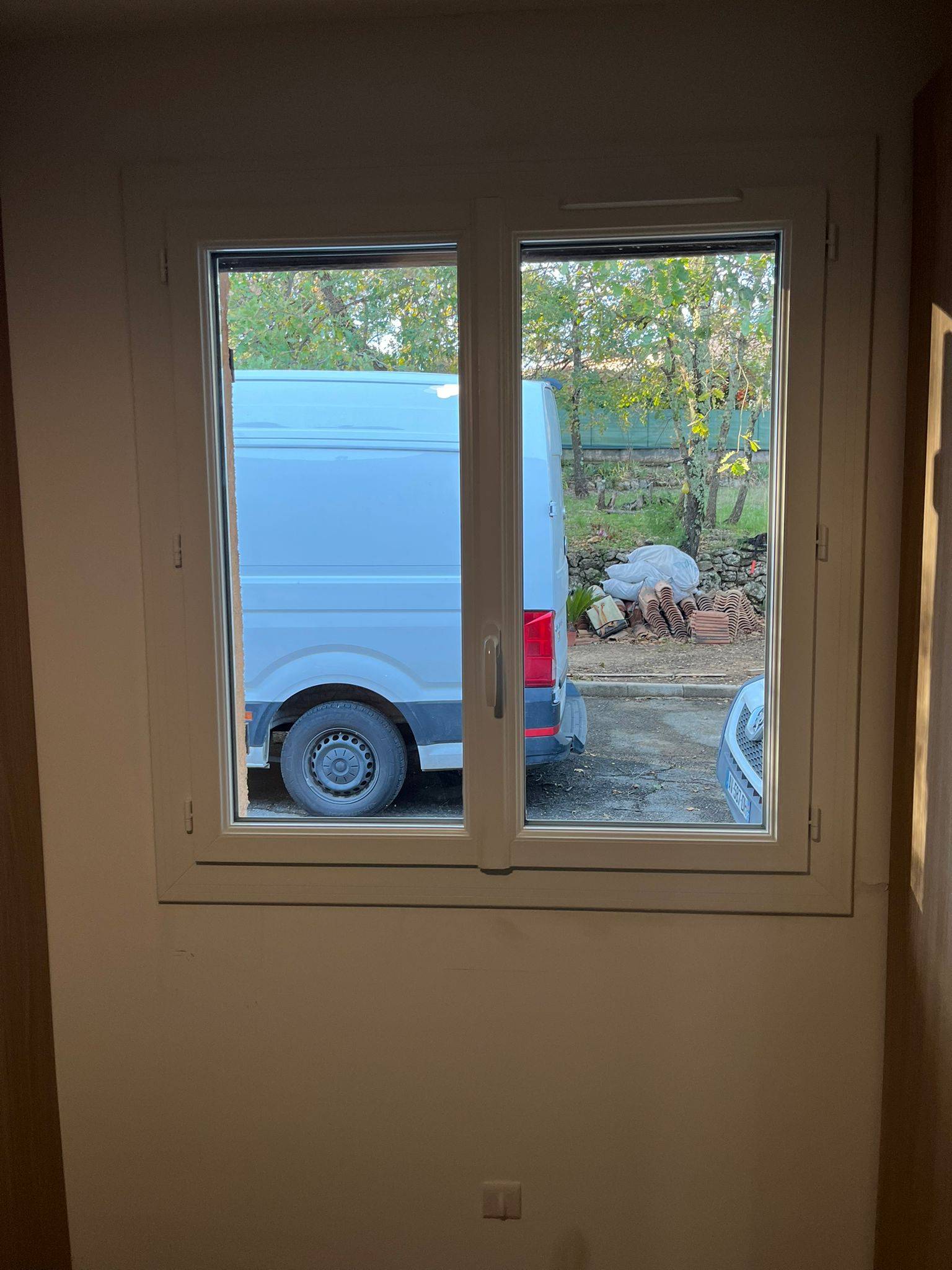 Fenêtre deux vantaux en PVC